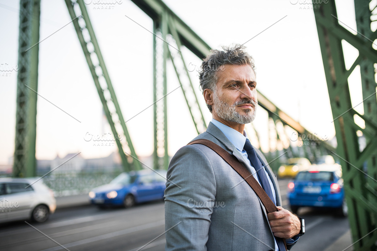 Mature businessman in a city. in Graphics - product preview 8