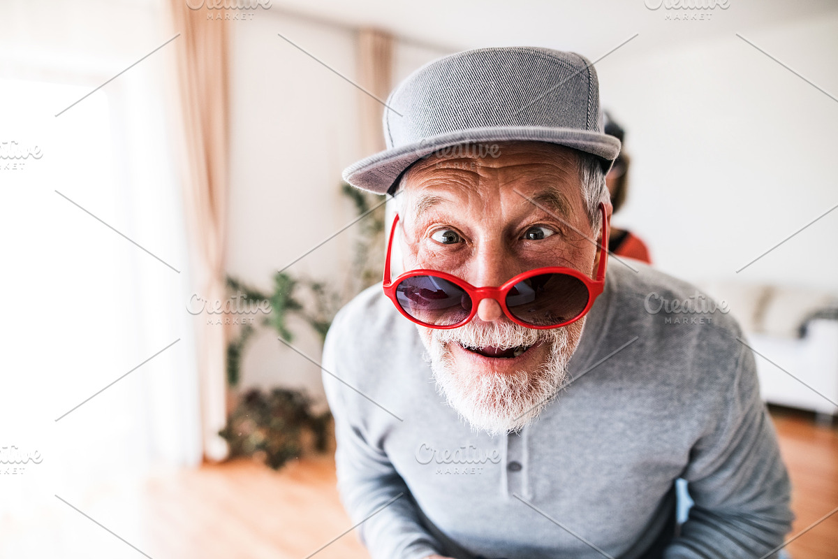Senior man having fun at home. in Graphics - product preview 8