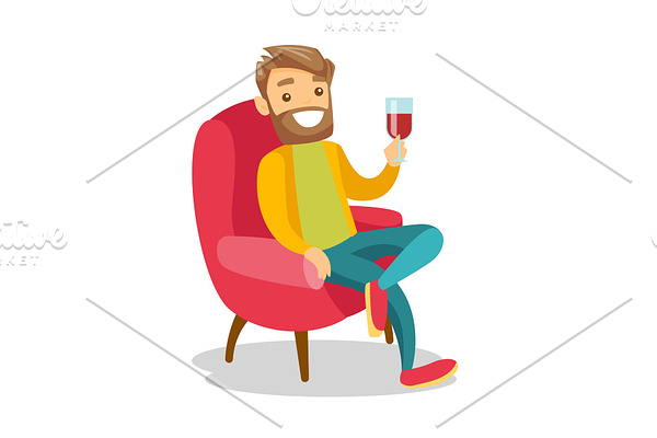 Caucasian white man drinking wine in the chair.