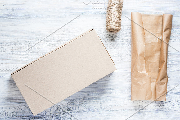 Mockup of box, envelope and paper  in Product Mockups - product preview 1