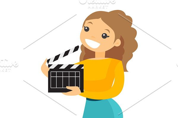 Smiling woman holding an open clapperboard.
