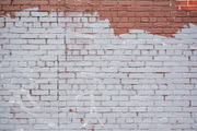 Painted grungy brick wall texture.