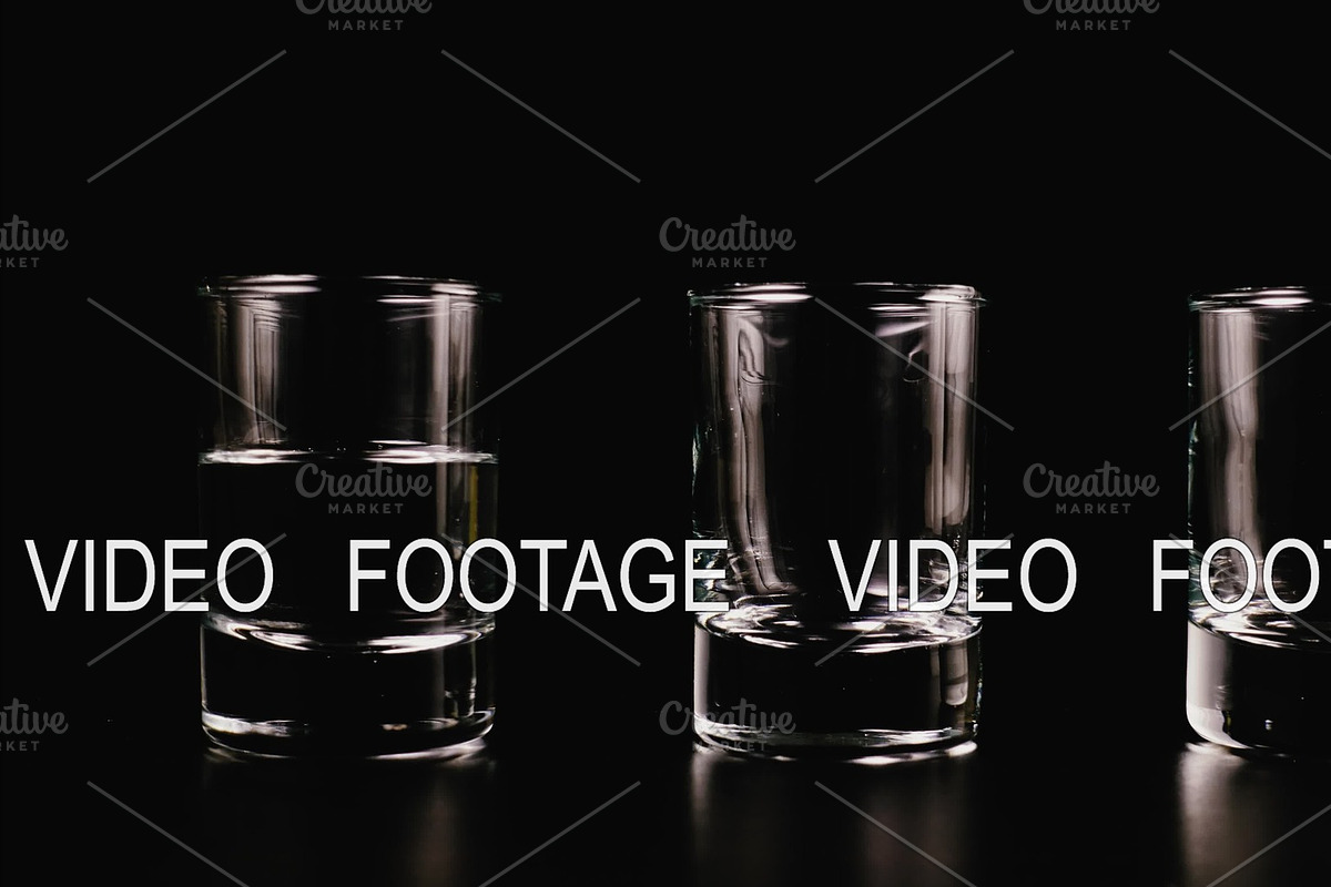 Vodka fills a glass on a black background. Stop motion, animation in Graphics - product preview 8