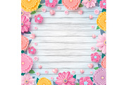 Colorful flowers on wood background