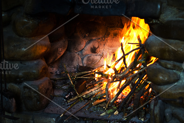 Fire in a rustic fireplace