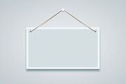 Blank sign board hanging on the wall