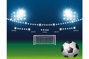 Soccer ball and goal with spotlight