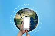 Hands touching smartphone with internet connected lines and global map background, social nets and network concept illustration, Elements of this image furnished by NASA