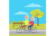 Happy Mature Couple Riding Together on Bike