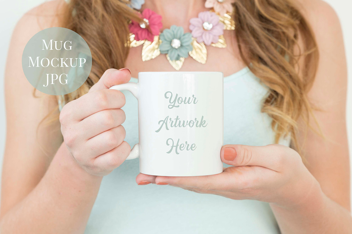 Woman holding mug mockup in Product Mockups - product preview 8