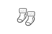 Baby pair of socks hand drawn outline doodle icon.