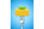 Corn cob at fork. Organic food.