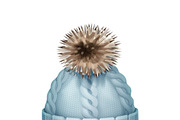 Blue knitted cap with pom-pom