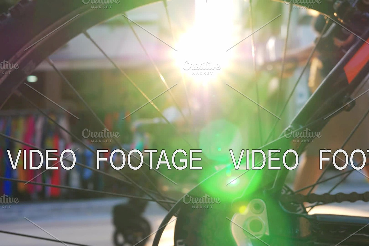 View through bike wheel to street and sun flare in Graphics - product preview 8