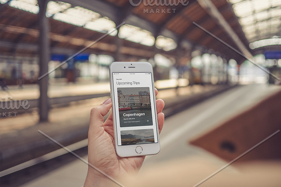 iPhone at the railway station in Mobile & Web Mockups - product preview 1