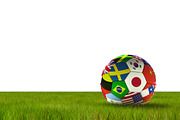Soccer football with country flags isolated on white background with lush grass. World championship. 3d illustration.