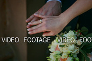 slowly, close up, bride with groom, wedding rings on hands
