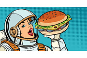 Hungry woman astronaut eating Burger