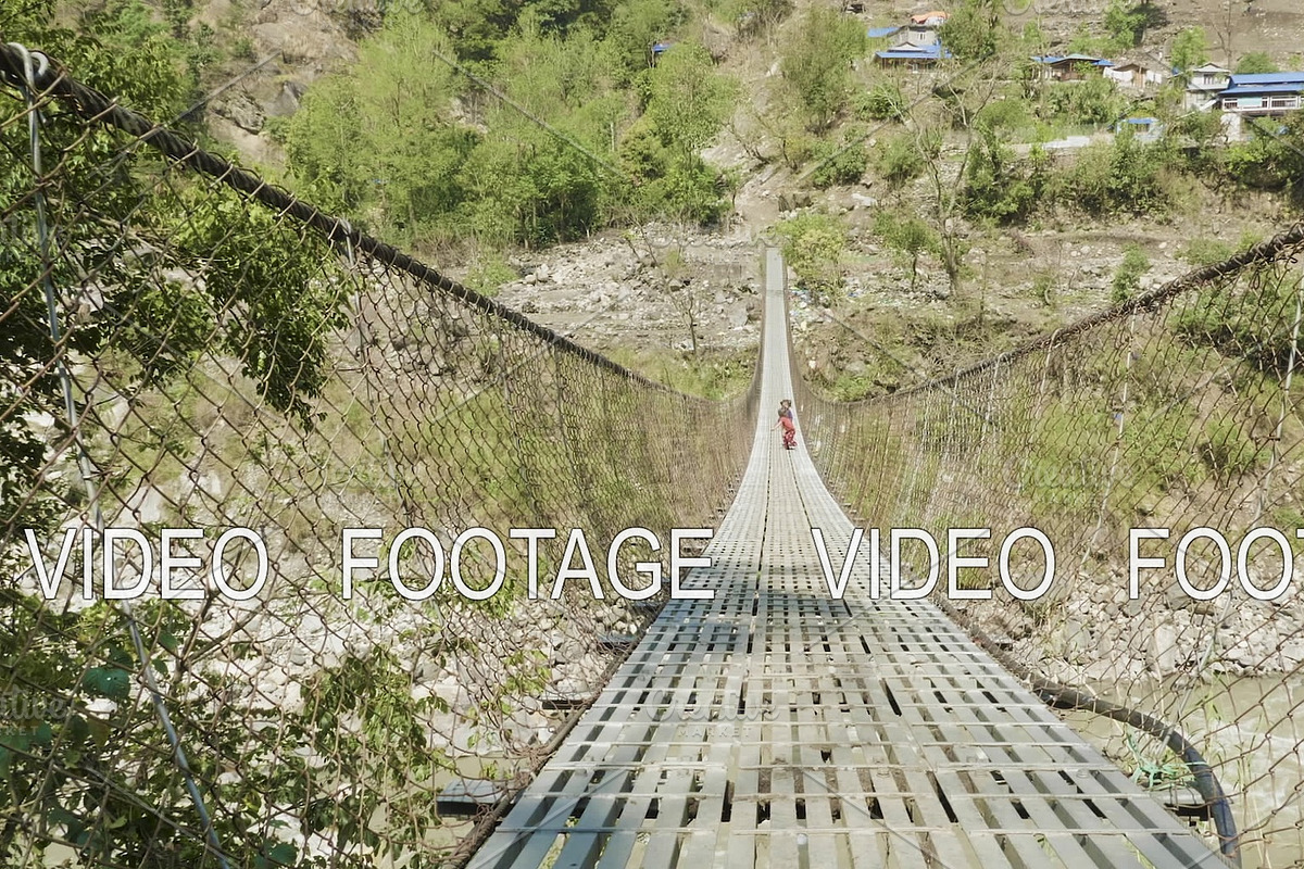 Local kids run and play on the suspension bridge over the river in Nepal. in Graphics - product preview 8
