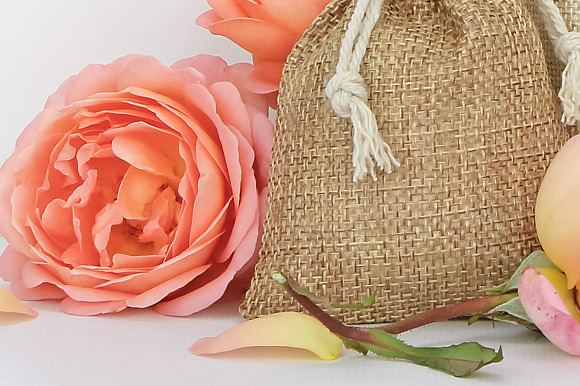 Bags with a tag mockup, orange roses in Product Mockups - product preview 1