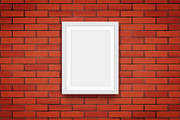 Red brick wall with picture frame