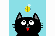 Black cat head looking at honey bee