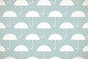 White umbrellas on blue pattern
