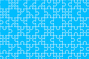 White puzzles pieces on blue