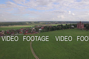 Flying over green meadows and Lukino