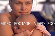 Wistful mother with baby on the
