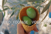 Green olives in waffle cone