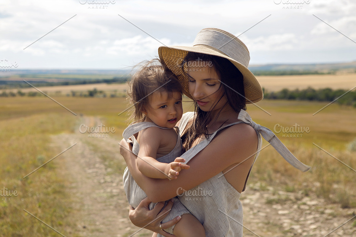 mother and son standing in the field in Graphics - product preview 8