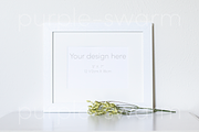 White Frame Mockup with Flowers