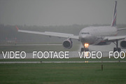 A330 landing on wet runway
