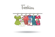 Illustration with dresses on hangers