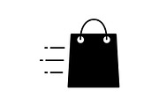 Flying shopping bag glyph icon