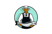 African American Fishmonger Holding 