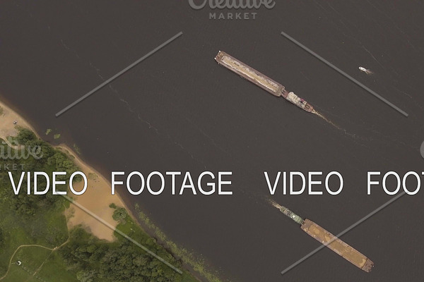 Aerial view:Barge on the river.