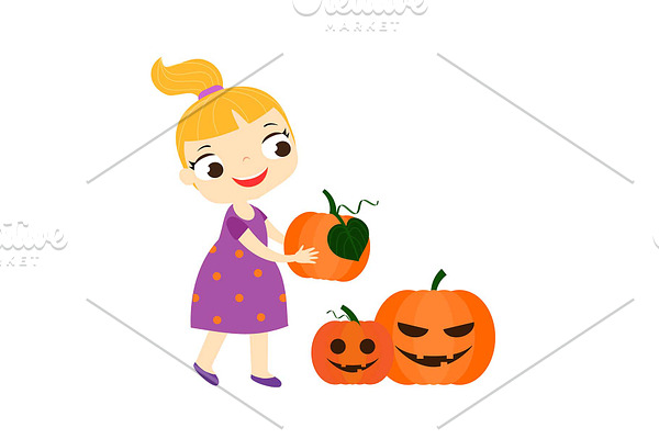 girl holding halloween pumpkins