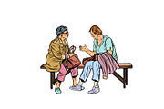 two elderly women sitting on a bench