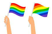 Rainbow flag in hand
