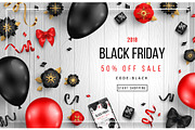 Black Friday on Wooden Background