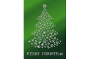 Green Christmas card with a tree