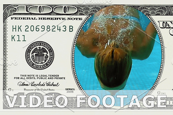 Woman is diving in 100 dollar bill