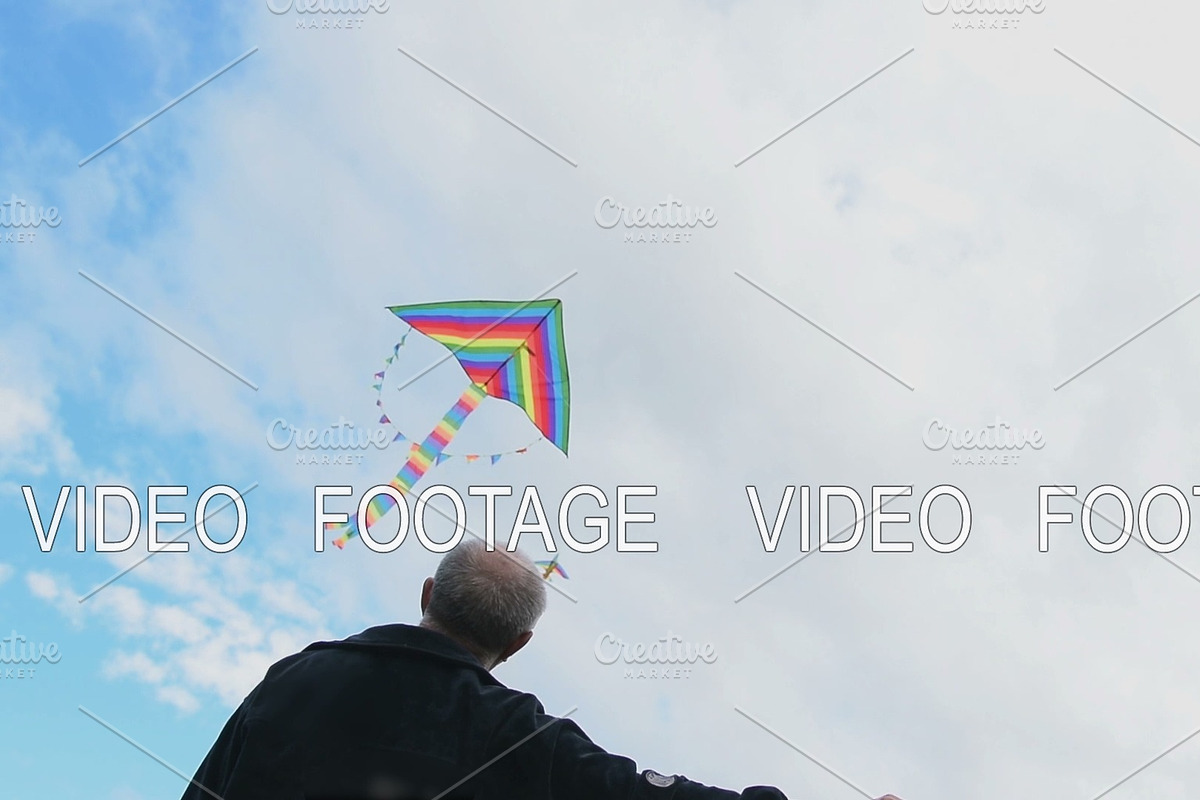 Senior man flying kite, view against in Graphics - product preview 8