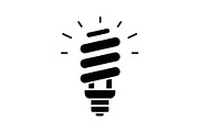 Energy saving light bulb glyph icon