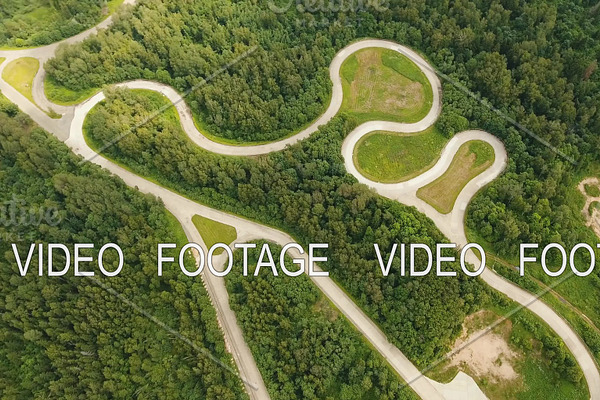 Test road in the forest. Aerial view