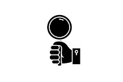 Hand with magnifier black icon