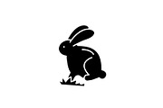 Cute easter bunny black icon, vector