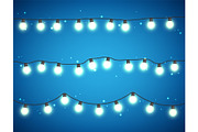 Christmas glowing lights on white